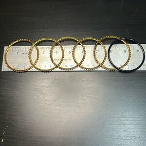 Brown/gold pebbled bangle set with one black velvet bangle. Set of 6. Brand new